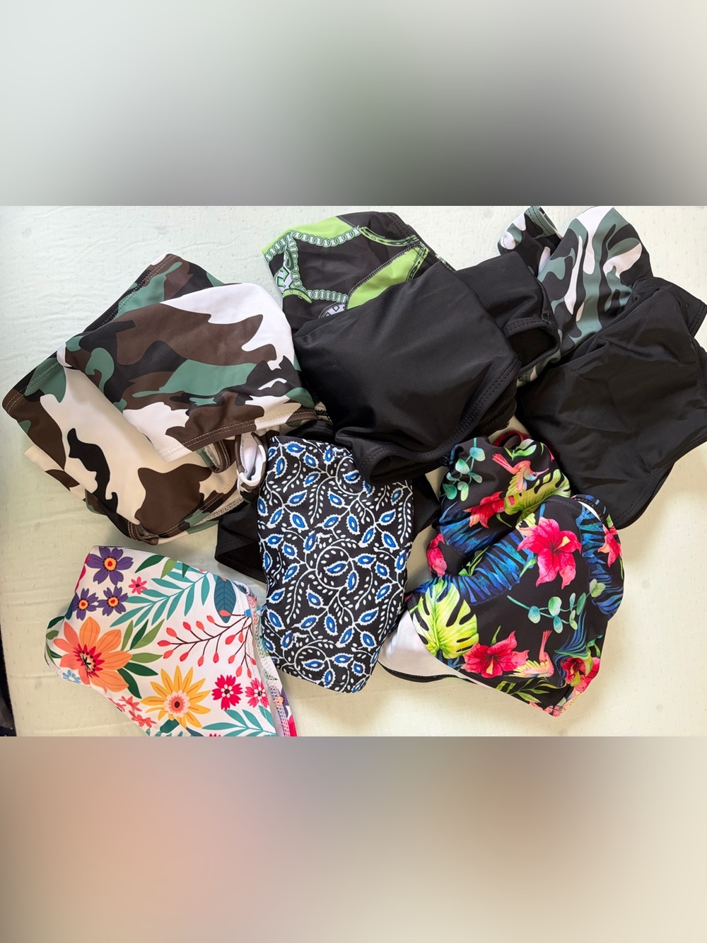 Lot of bikinis with bandeau tops Floral, Camo, Black, geometric. Mix and match.